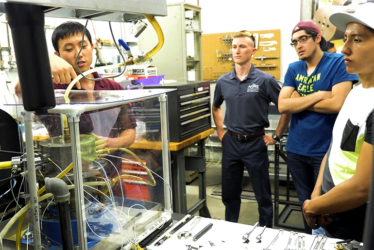 students examine the turbo lab