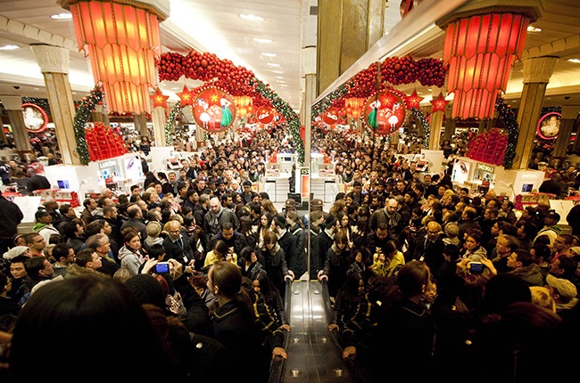 NEW YORK - NOVEMBER 25: Bargain hunters shop for discounted merchandise at Macy's on 'Black Friday' on November 25, 2011 in New York City. Marking the start of the holiday shopping season, 'Black Friday' is one of American retailers' busiest days of the year. (Photo by Michael Nagle/Getty Images)