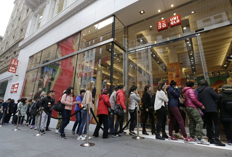 In-person shopping remains popular. (Jeff Chiu/AP)