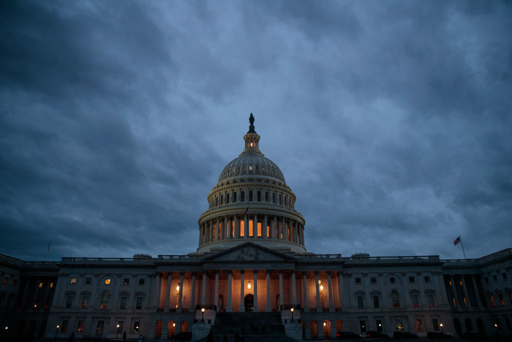 WASHINGTON, DC - JANUARY 21: The U.S. Capitol is seen at dusk, January 21, 2018 in Washington, DC. Lawmakers are convening for a Sunday session to try to resolve the government shutdown. (Photo by Drew Angerer/Getty Images)
