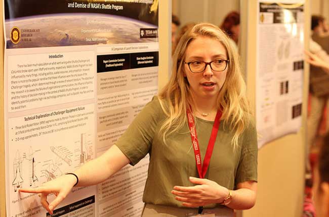 Hannah Guyton presents at LAUNCH: Undergraduate Research first-ever Undergraduate Research Scholars Symposium