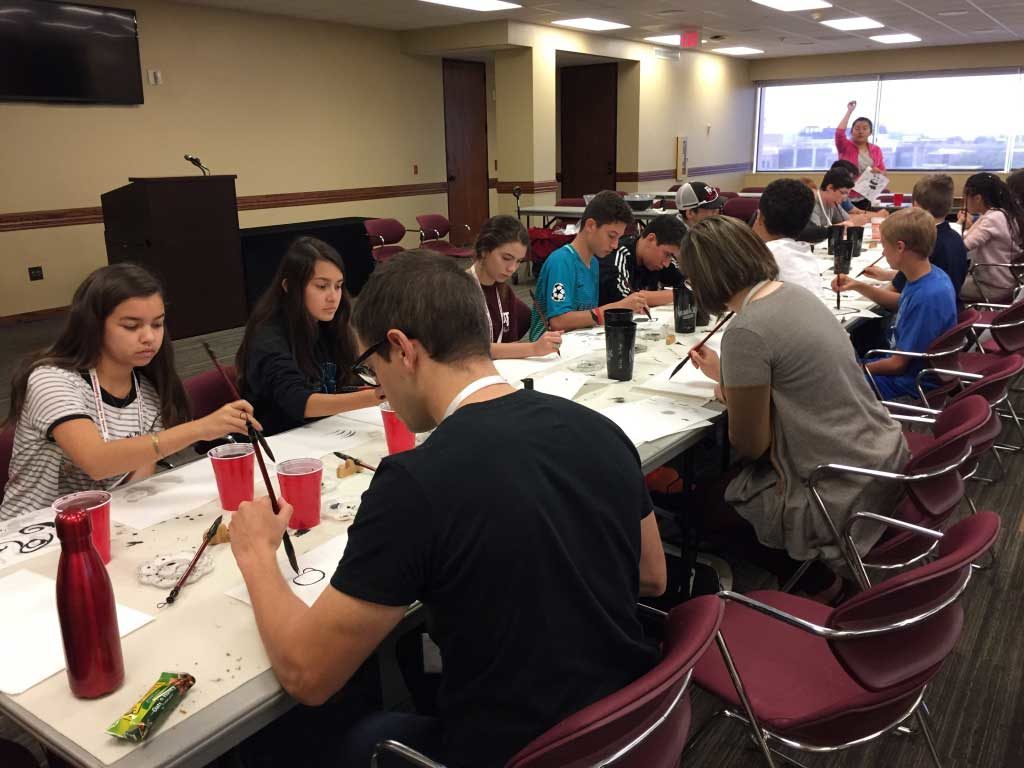 campers work with brushes at P4C summer camp