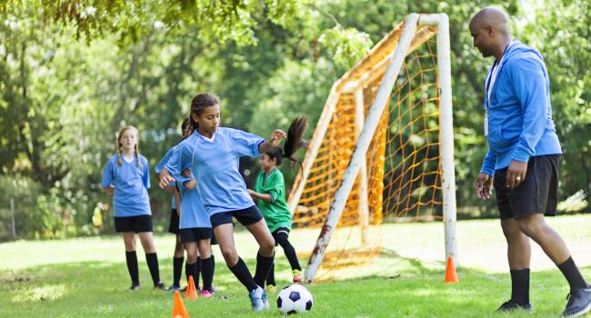 girls playing soccer