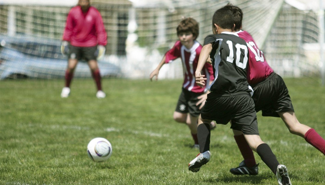 boys playing soccer
