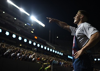 yell leader points into the stands at midnight yell